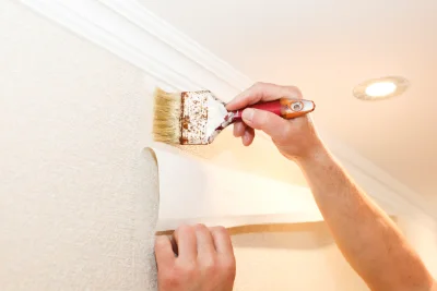 Pose de papier peint au Val-d'Esnoms — revêtements muraux et toiles de verre
